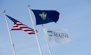 University of Maine flags (UMaine, state, and national)