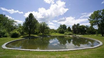 Image of pond with stone border