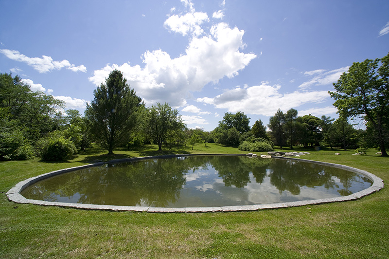 Image of pond with stone border